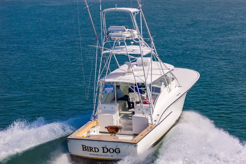 Carry On Yacht Photos Pics 2003 Custom Carolina Layton Express boat on the sea.