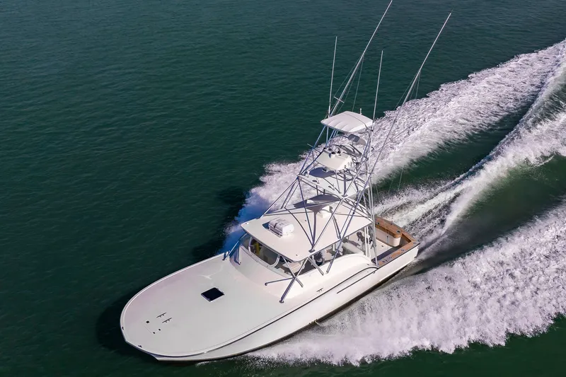 Carry On Yacht Photos Pics 2003 Custom Carolina Layton Express on water, aerial view.