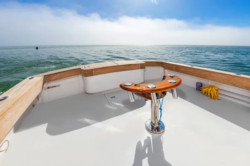 Carry On Yacht Photos Pics Deck of a 2003 Custom Carolina Layton Express boat on the sea.