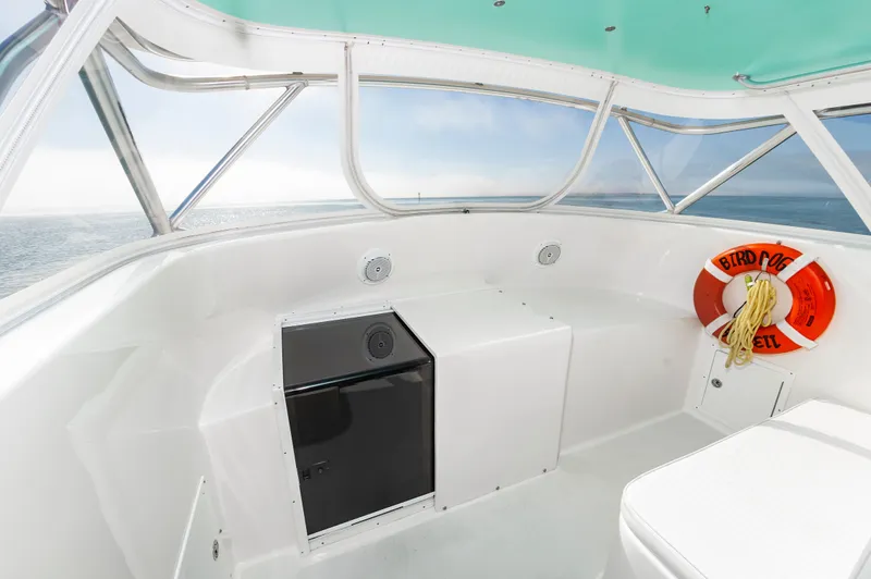 Carry On Yacht Photos Pics Interior of a 2003 Custom Carolina Layton Express boat with lifebuoy.