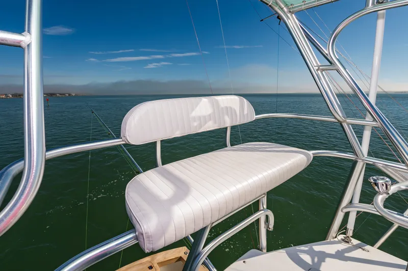 Carry On Yacht Photos Pics Seat on Custom Carolina Layton Express 2003, overlooking the sea.
