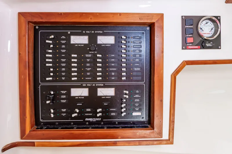 Carry On Yacht Photos Pics Electrical control panel on a 2003 Custom Carolina Layton Express boat.