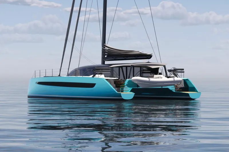 Hh80 New Yacht Photos Pics 2026 HH Catamarans HH80 sailing on calm waters under a cloudy sky.