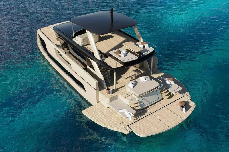  Yacht Photos Pics Luxury Sunreef 66 Ultima yacht, 2026 model, cruising on clear blue waters.