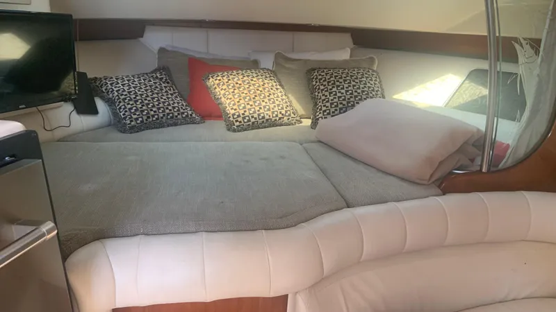  Yacht Photos Pics Interior of 2006 Grady-White 360 Express with cozy seating and decorative pillows.