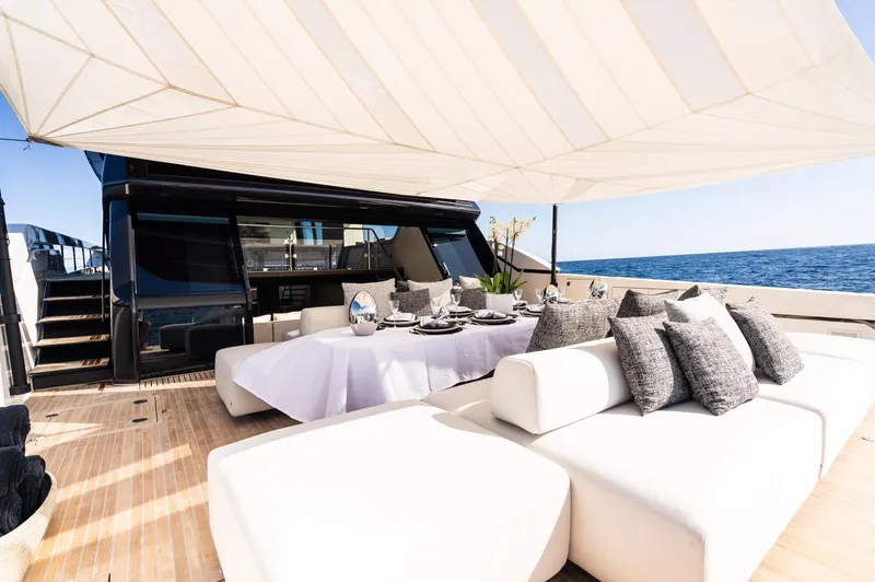 Anmax Yacht Photos Pics Luxurious Sanlorenzo SP110 yacht deck with elegant seating and dining area, 2022 model.