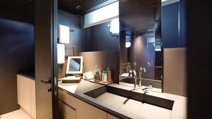 Anmax Yacht Photos Pics Luxurious bathroom interior on 2022 Sanlorenzo SP110 yacht, featuring modern fixtures and elegant design.