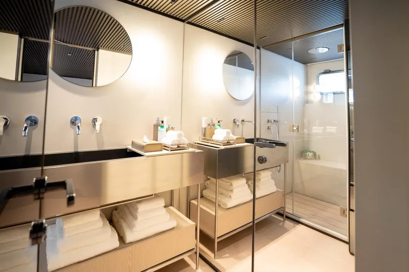 Anmax Yacht Photos Pics Luxurious bathroom in 2022 Sanlorenzo SP110 yacht with modern fixtures and elegant design.