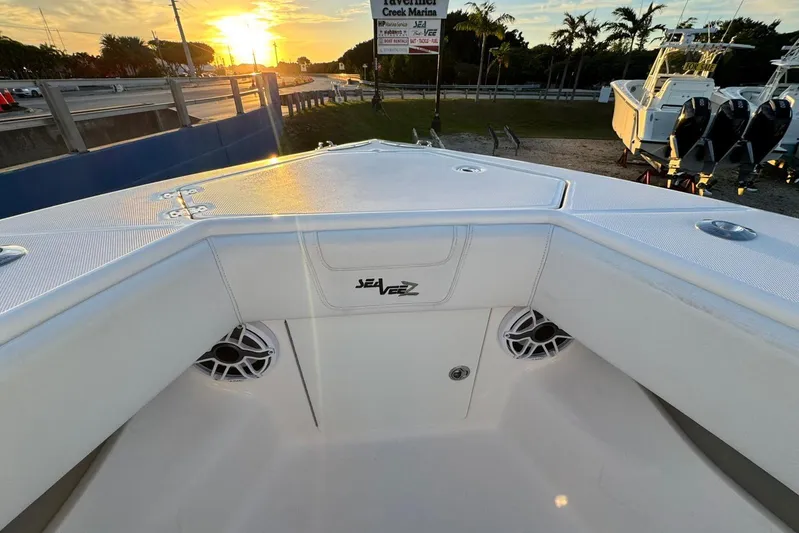  Yacht Photos Pics 2022 SeaVee 340Z boat deck at sunset, featuring speakers and sleek design.