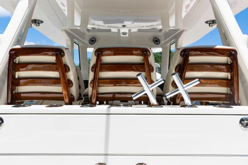  Yacht Photos Pics 2022 SeaVee 450z boat interior with luxurious seating and rod holders.