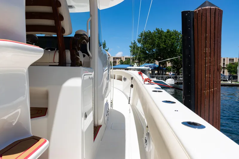  Yacht Photos Pics 2022 SeaVee 450z boat docked, showcasing sleek design and luxurious seating.