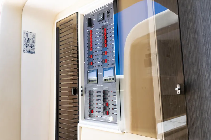  Yacht Photos Pics Electrical panel inside 2022 SeaVee 450z boat, featuring switches and controls.