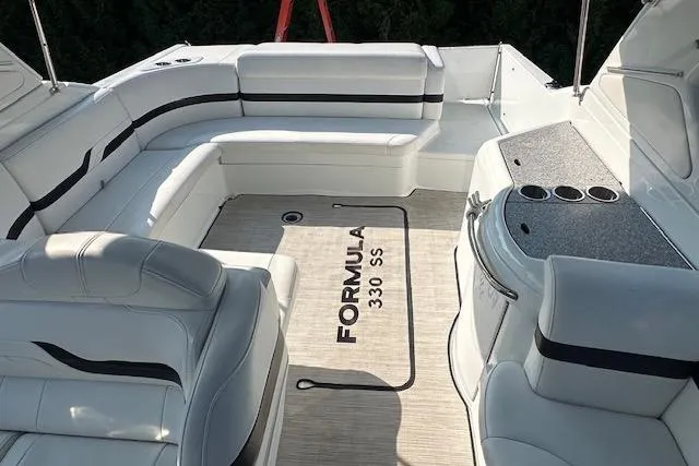  Yacht Photos Pics 2008 Formula 330 Sun Sport boat interior with white seating and sleek design.