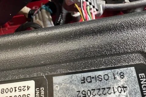  Yacht Photos Pics Close-up of a 2008 Formula 330 Sun Sport engine with visible wiring and labels.