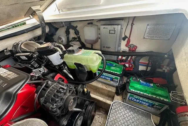  Yacht Photos Pics Engine compartment of a 2008 Formula 330 Sun Sport boat with batteries and wiring.