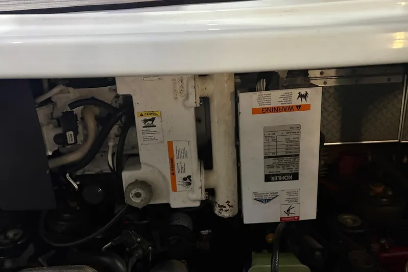  Yacht Photos Pics Engine compartment of a 2008 Formula 330 Sun Sport boat with visible Kohler generator.