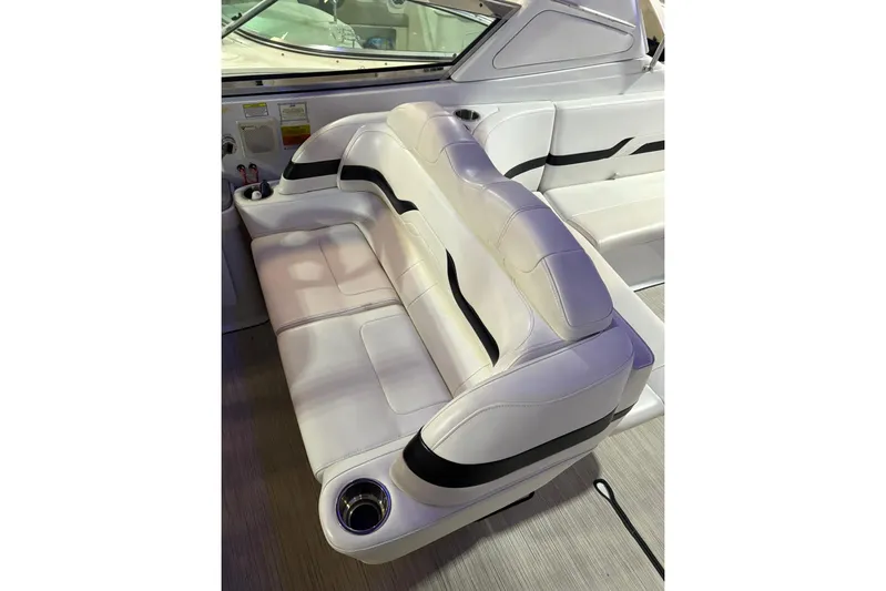  Yacht Photos Pics 2008 Formula 330 Sun Sport boat interior with white leather seating and cup holders.