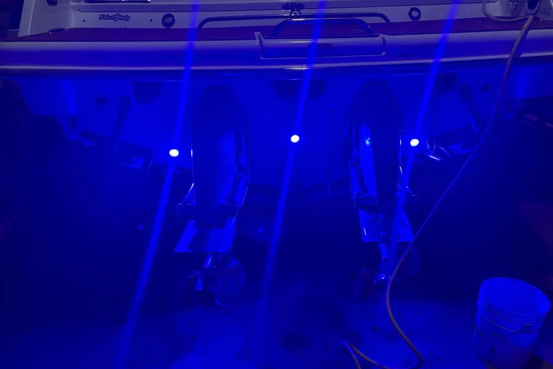  Yacht Photos Pics 2008 Formula 330 Sun Sport boat with blue underwater lights illuminating the stern.