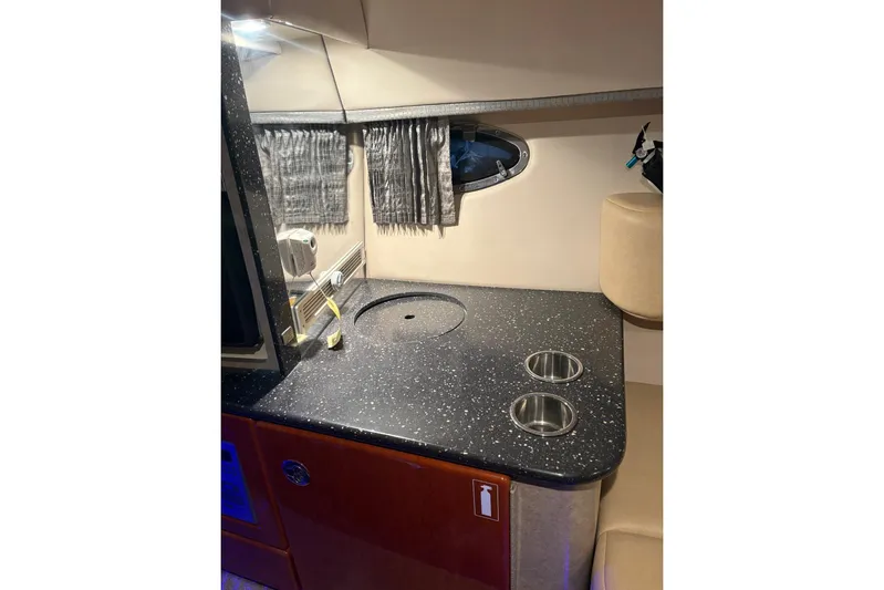  Yacht Photos Pics 2008 Formula 330 Sun Sport interior with sleek countertop and modern fixtures.