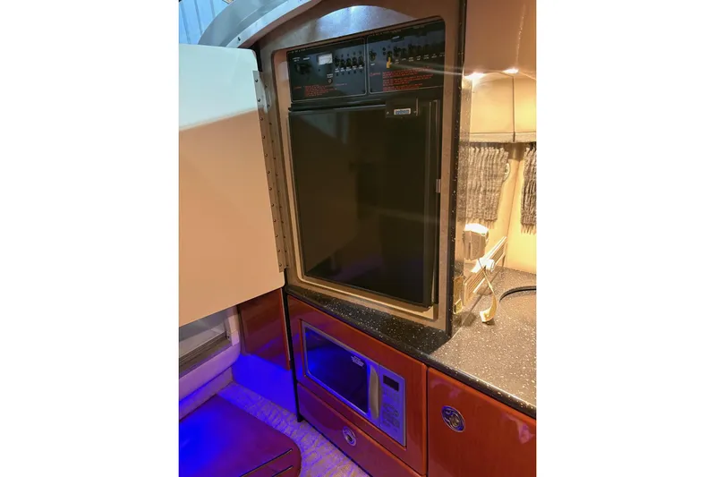  Yacht Photos Pics 2008 Formula 330 Sun Sport interior kitchen with fridge and microwave.