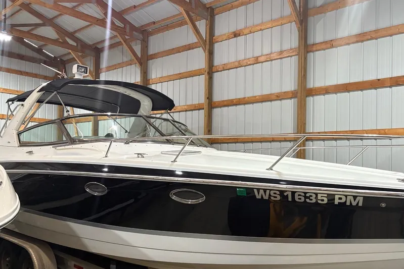  Yacht Photos Pics 2008 Formula 330 Sun Sport boat in storage facility.