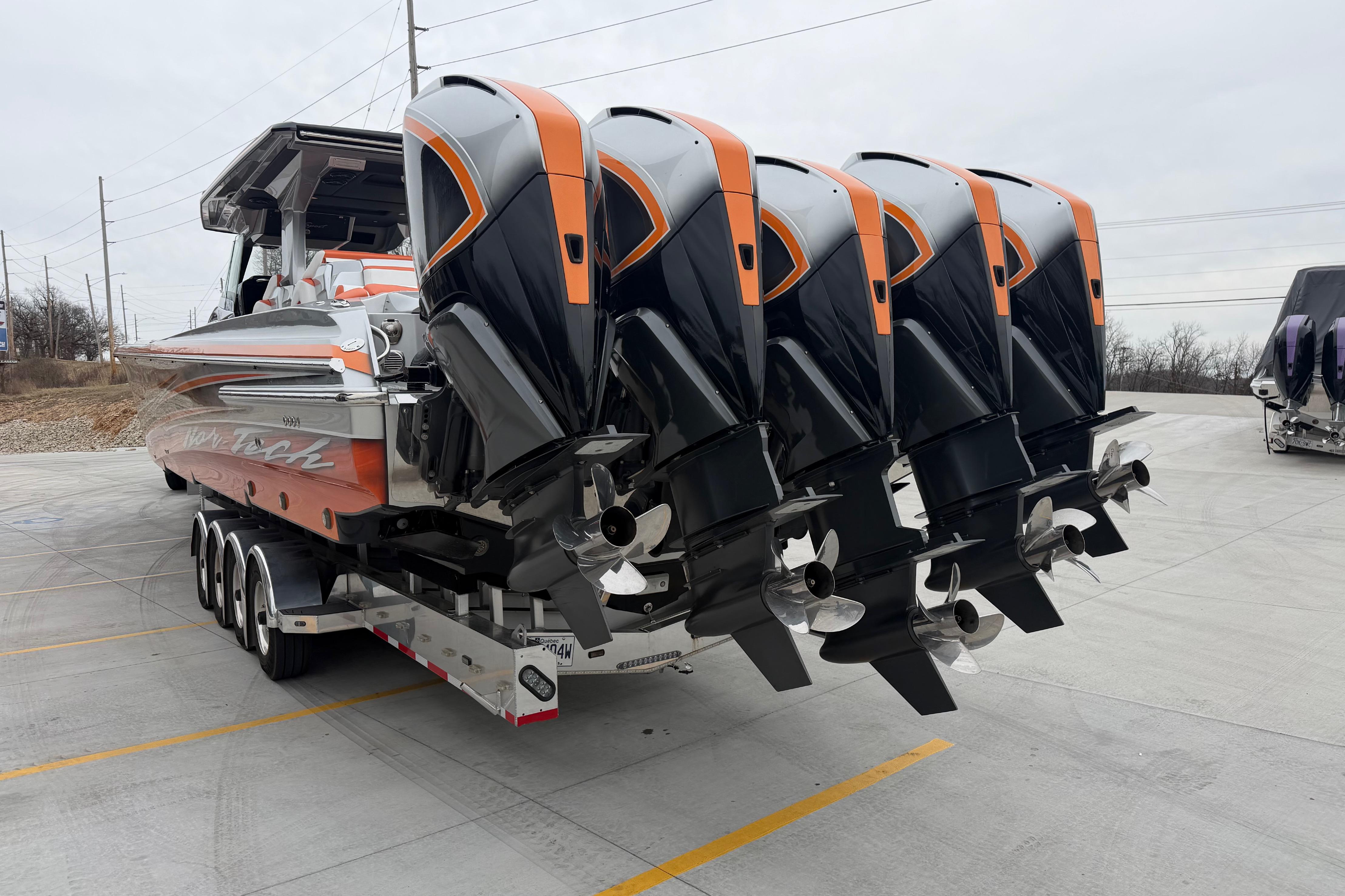 2024 Nor-Tech 500 Sport Center Console with five powerful outboard engines on a trailer.