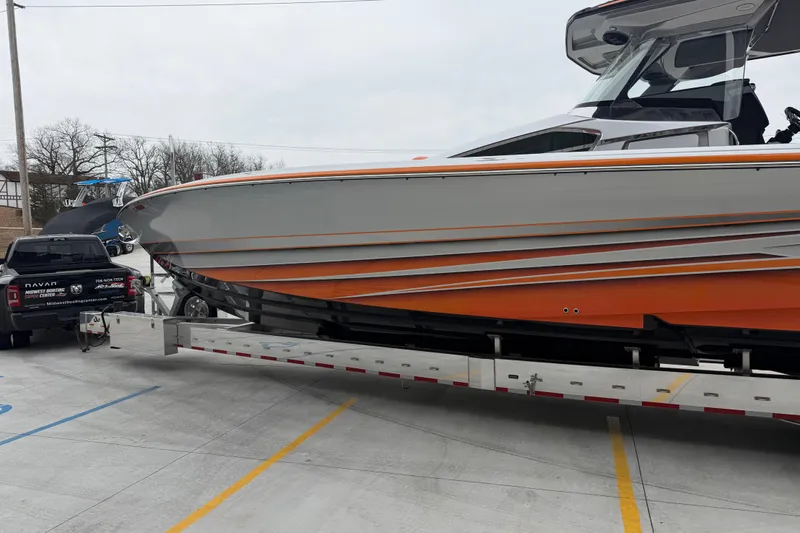  Yacht Photos Pics 2024 Nor-Tech 500 Sport Center Console boat on trailer, parked in a lot.