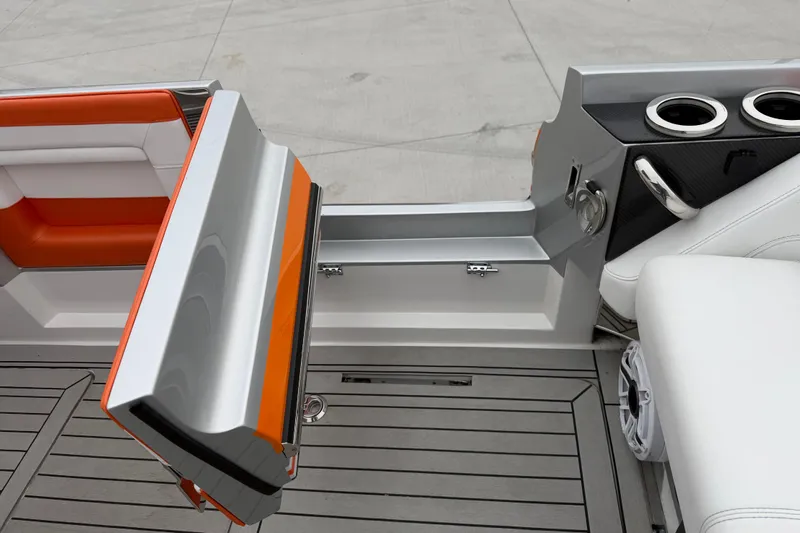  Yacht Photos Pics 2024 Nor-Tech 500 Sport Center Console interior with orange accents and cup holders.