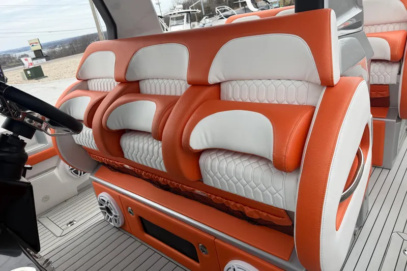  Yacht Photos Pics 2024 Nor-Tech 500 Sport Center Console interior with orange and white seating.