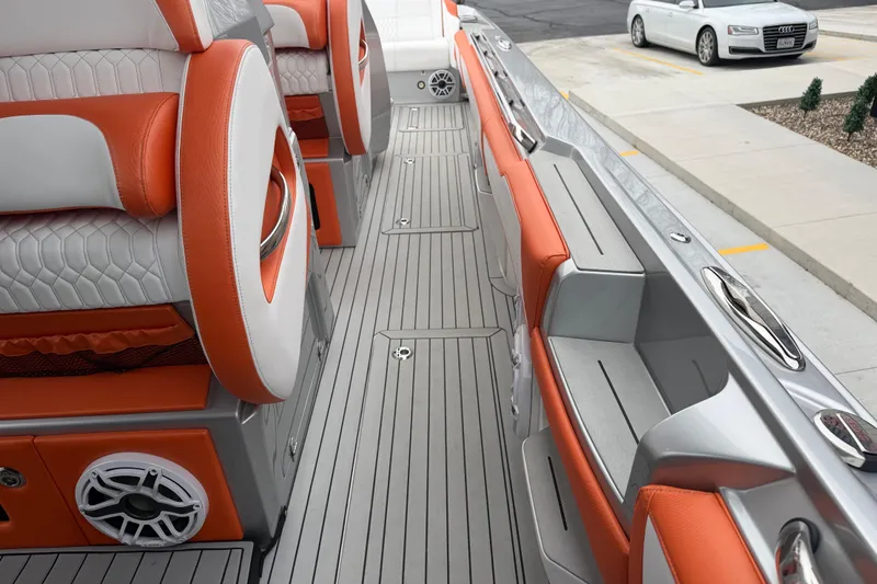  Yacht Photos Pics 2024 Nor-Tech 500 Sport Center Console interior with orange and gray seating, sleek design.