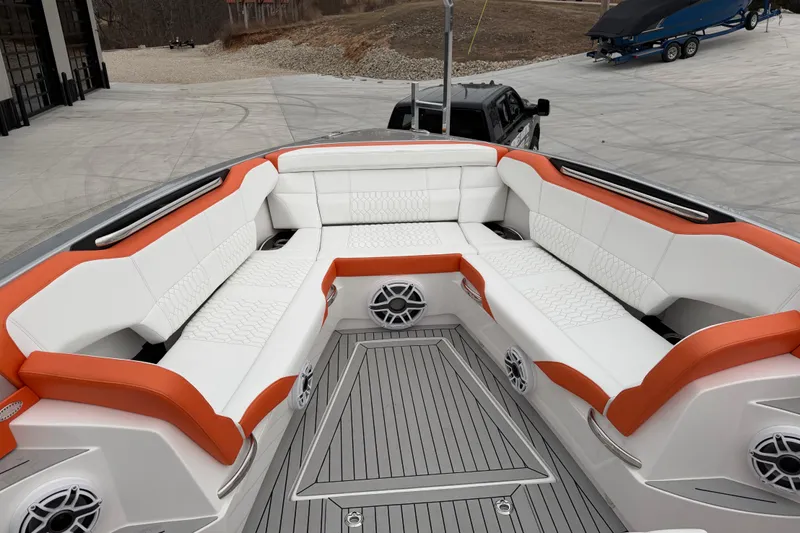  Yacht Photos Pics 2024 Nor-Tech 500 Sport Center Console with luxurious white and orange seating.
