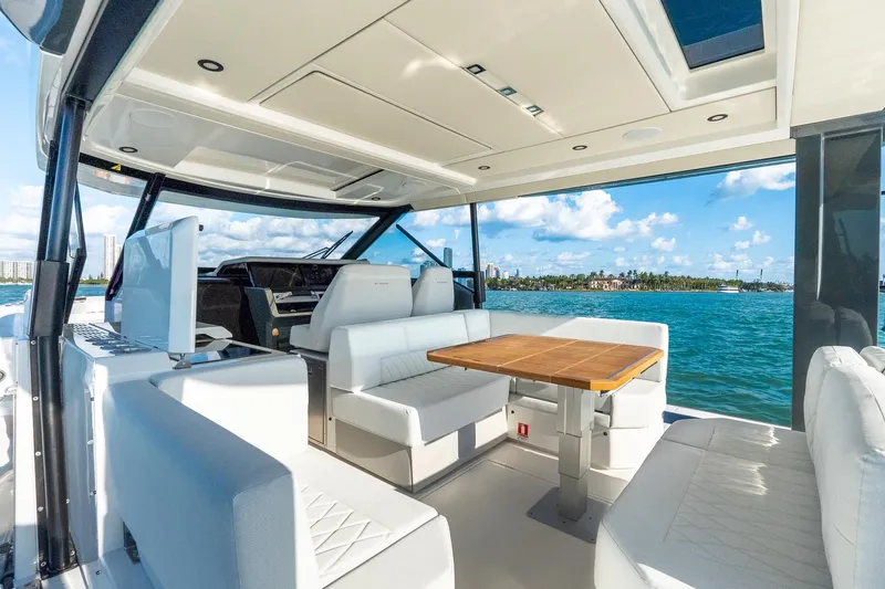  Yacht Photos Pics Luxurious interior of 2025 Saxdor 400 GTO yacht with ocean view and modern seating.