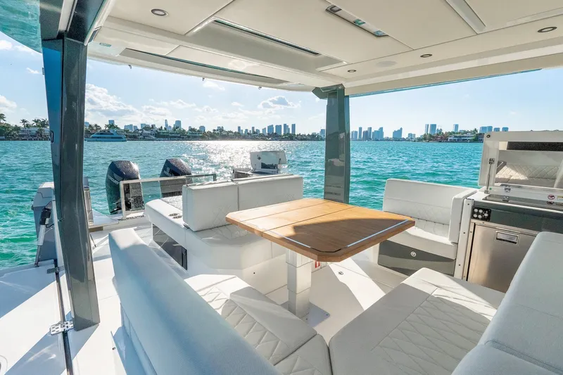  Yacht Photos Pics Luxurious 2025 Saxdor 400 GTO yacht interior with scenic waterfront view.