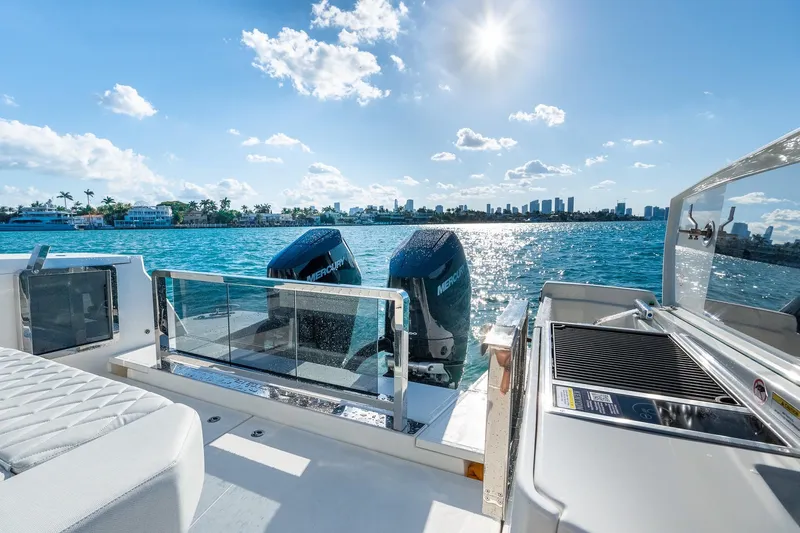  Yacht Photos Pics 2025 Saxdor 400 GTO boat with twin Mercury engines on a sunny day.