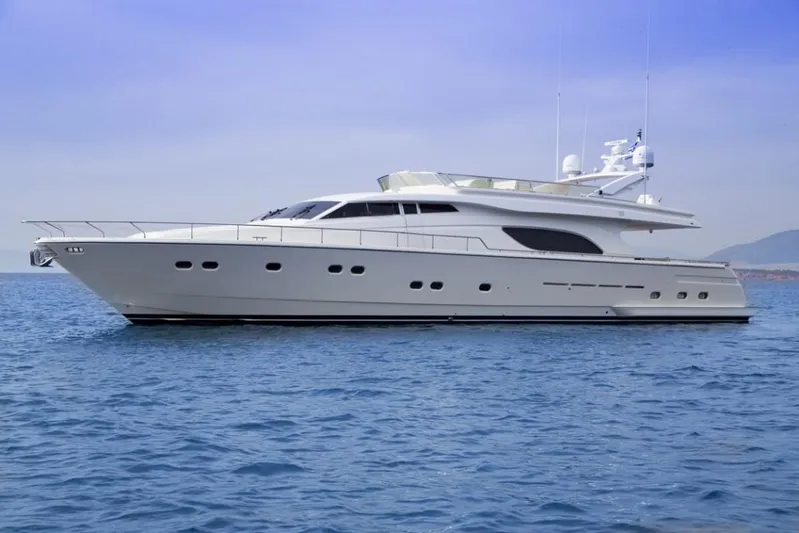  Yacht Photos Pics Luxury 2001 Ferretti Yachts 80 RPH cruising on calm blue waters.
