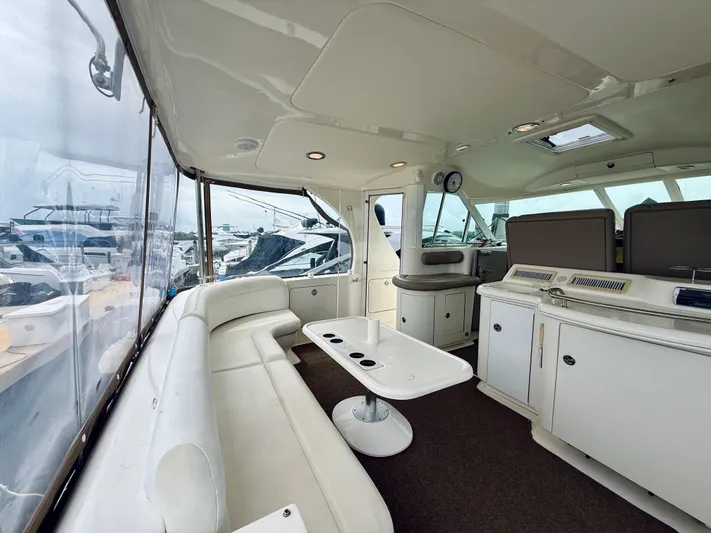  Yacht Photos Pics 2003 Sea Ray 480 Motor Yacht interior with white seating and modern amenities.