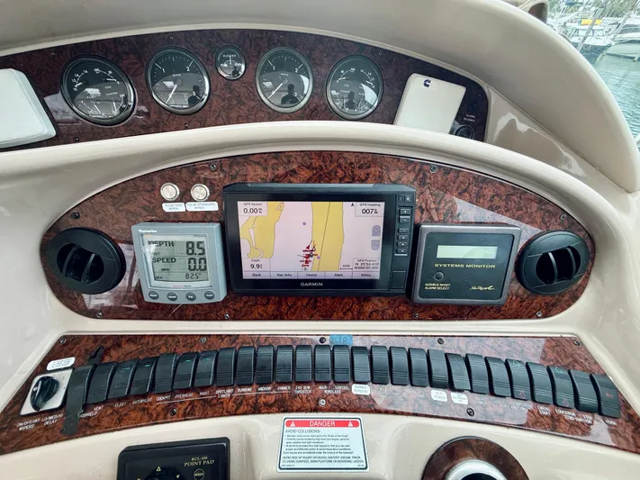  Yacht Photos Pics 2003 Sea Ray 480 Motor Yacht dashboard with navigation and control systems.