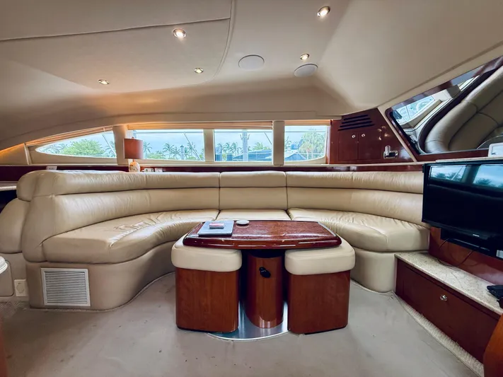  Yacht Photos Pics Luxurious interior of 2003 Sea Ray 480 Motor Yacht with plush seating and elegant wood finishes.