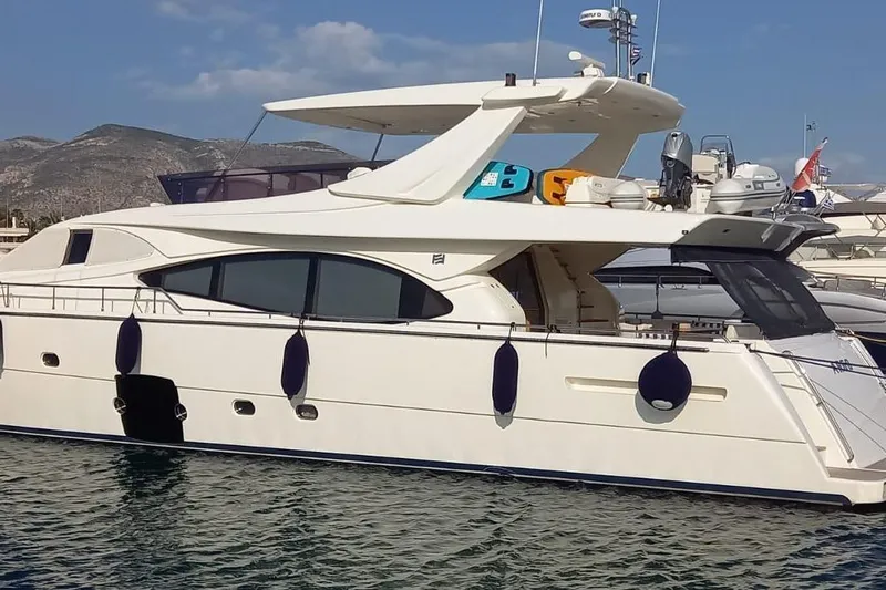  Yacht Photos Pics 2006 Ferretti 780 yacht docked, showcasing sleek design and luxury features.