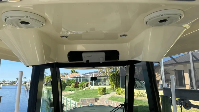  Yacht Photos Pics 2023 Chris-Craft Catalina 24 boat interior with speakers and electronics.