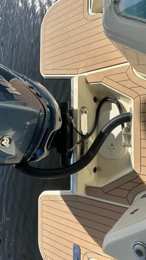  Yacht Photos Pics 2023 Chris-Craft Catalina 24 boat engine and deck detail on water.