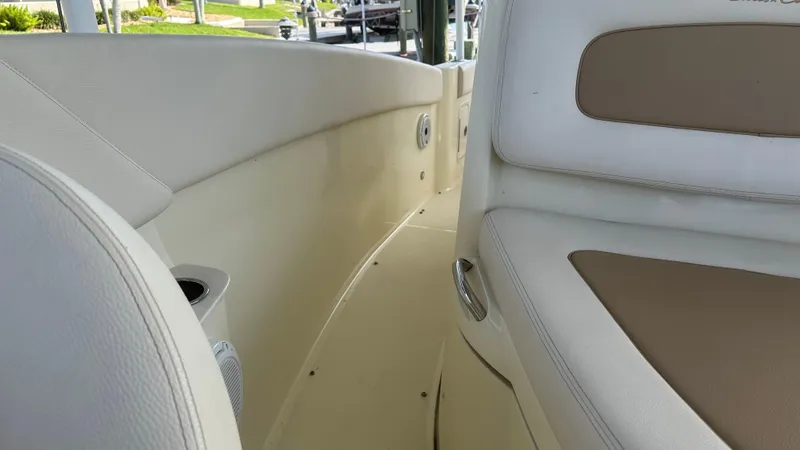  Yacht Photos Pics 2023 Chris-Craft Catalina 24 interior with beige seating and sleek design.