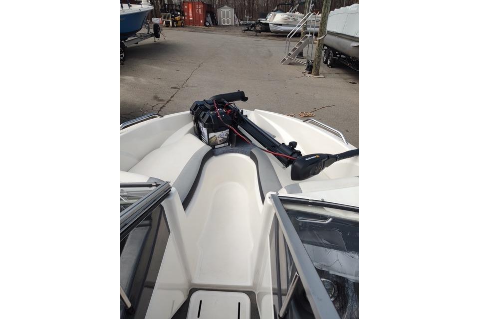 2014 Larson LX 160S OB boat interior with seating and equipment.