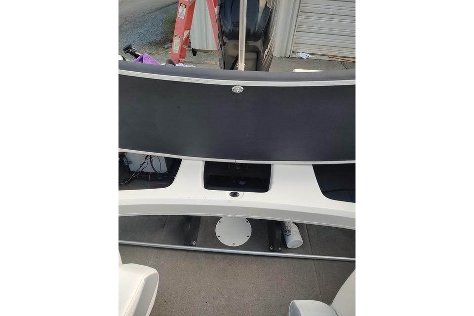2014 Larson LX 160S OB boat interior with dashboard and seating area.