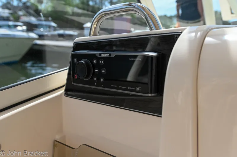  Yacht Photos Pics 2019 Grady-White Freedom 275 boat stereo system, featuring Fusion audio controls.