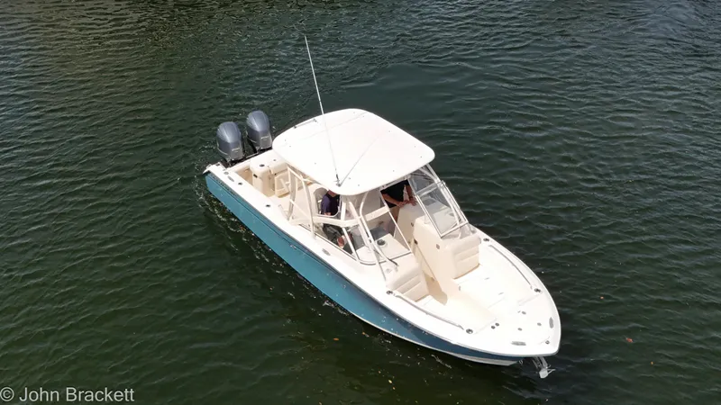  Yacht Photos Pics 2019 Grady-White Freedom 275 boat on water, aerial view, dual engines.