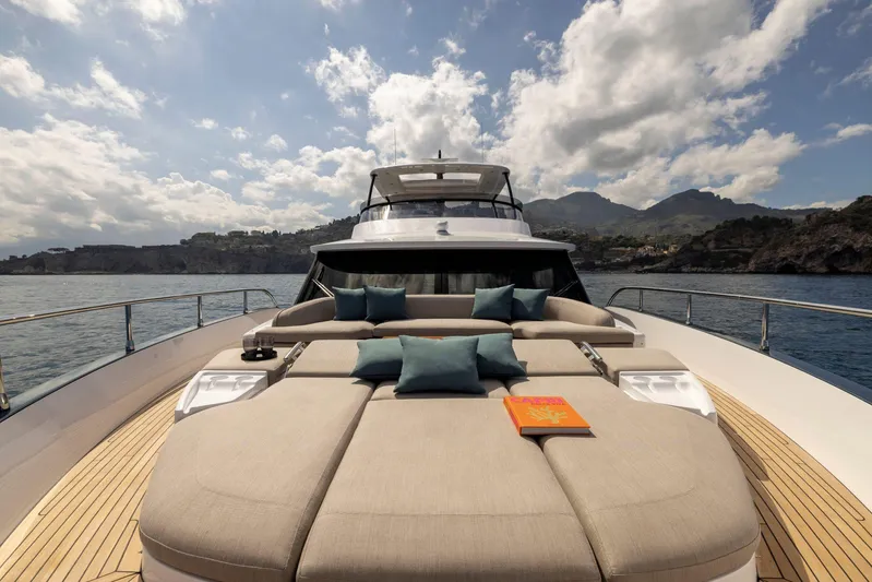  Yacht Photos Pics 2024 Azimut Magellano 60 yacht with luxurious deck and scenic ocean view.