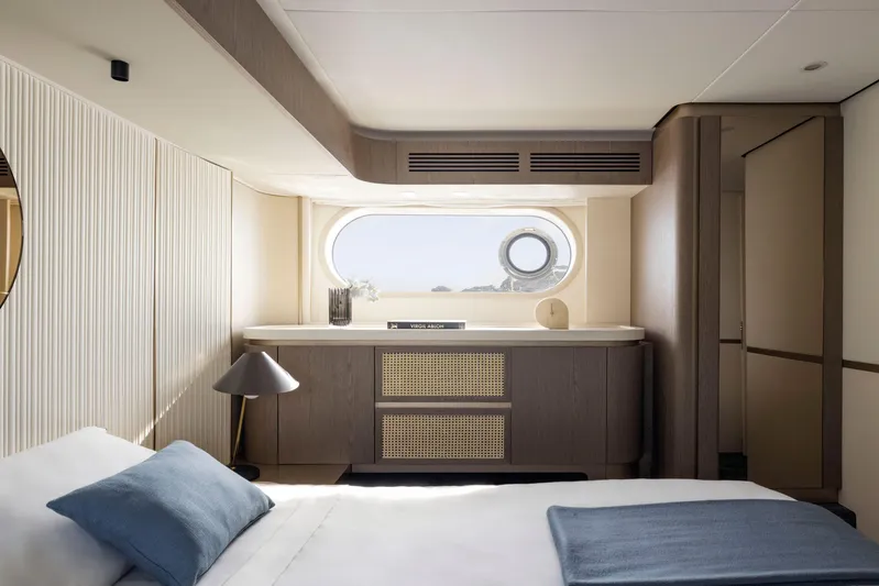 Yacht Photos Pics Luxurious bedroom interior of 2024 Azimut Magellano 60 yacht with modern design and ocean view.
