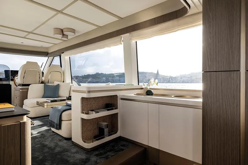  Yacht Photos Pics Luxurious interior of 2024 Azimut Magellano 60 yacht with panoramic windows and elegant furnishings.