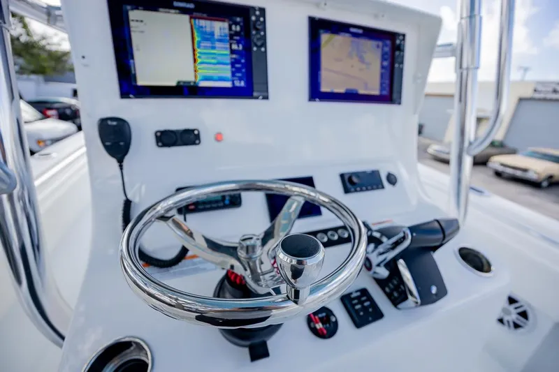  Yacht Photos Pics 2024 Contender 28 Tournament boat dashboard with advanced navigation systems and controls.